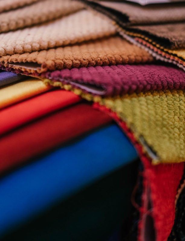 Colorful samples of upholstery fabrics for upholstered furniture.